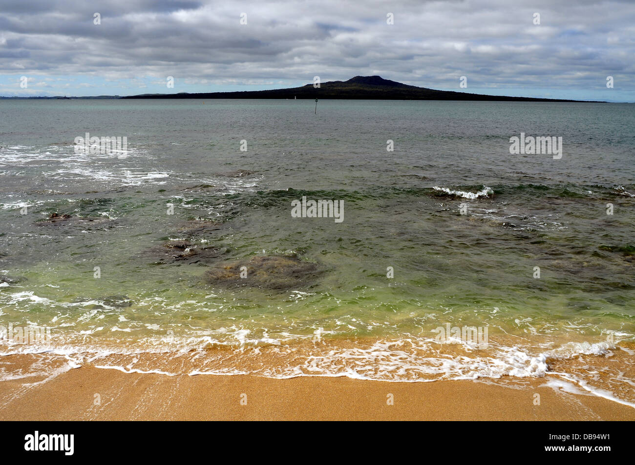 Rangitoto volcano island for Takapuna beach at cloudy day Stock Photo Alamy