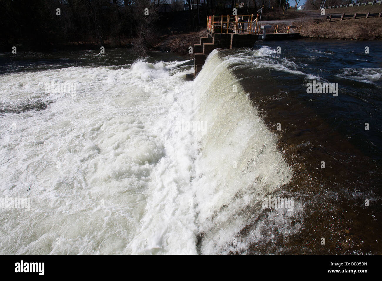 Water falls over the Norland Dam in the spring Stock Photo Alamy