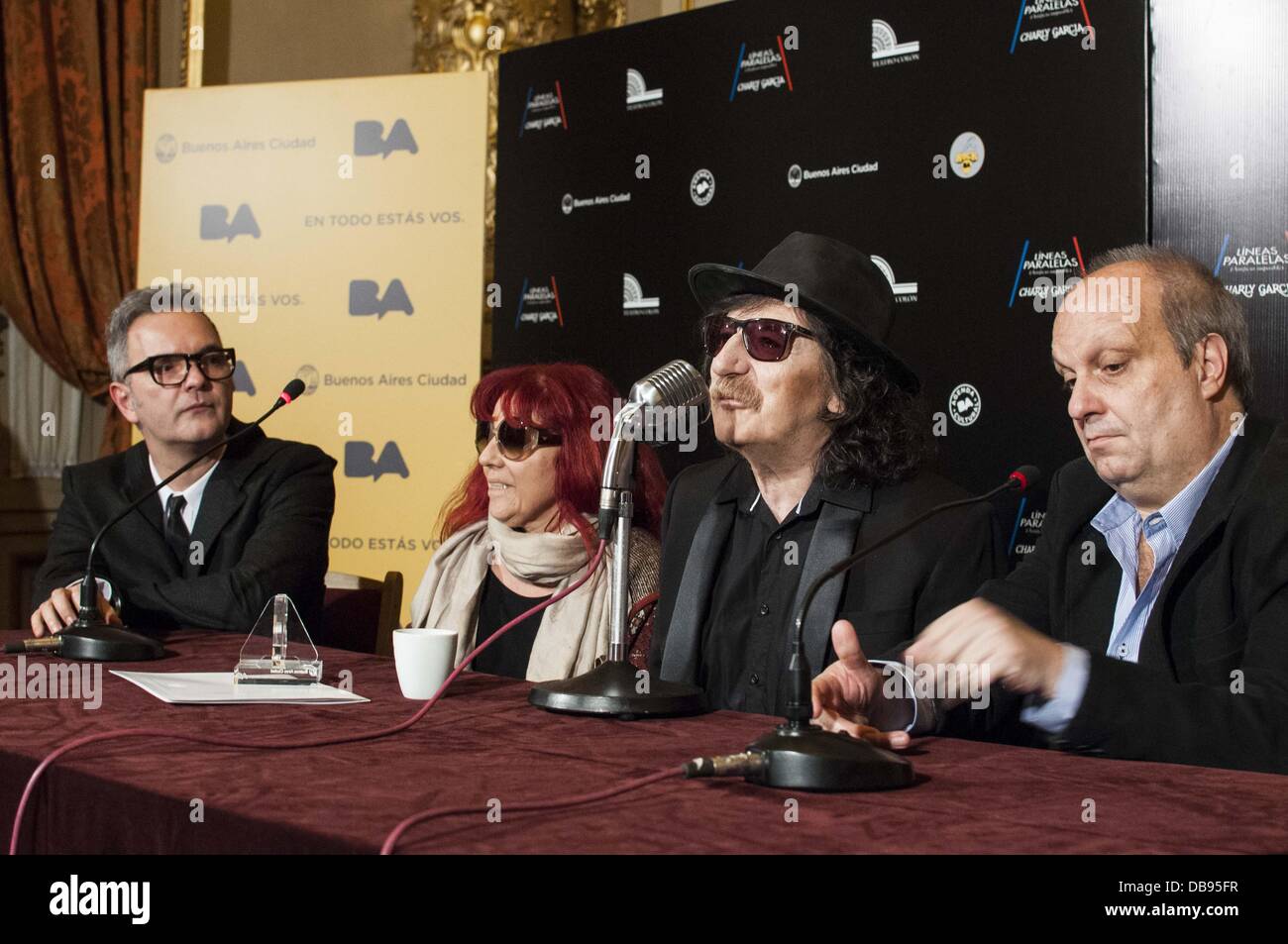 Buenos Aires, Buenos Aires, Argentina. 25th July, 2013. Introduced by Mayor Mayor Mauricio Macri, Argentinian rock star Charly Garcia announced two shows at the traditional Teatro Colon, the most important opera house in Argentina. In the event, he was named Cultural Ambassador of the city. He was surrounded by arranger Alejandro Teran (L), stage designer Renata Schussheim and Buenos Aires Ministry of Culture Hernan Lombardi Credit:  Patricio Murphy/ZUMAPRESS.com/Alamy Live News Stock Photo