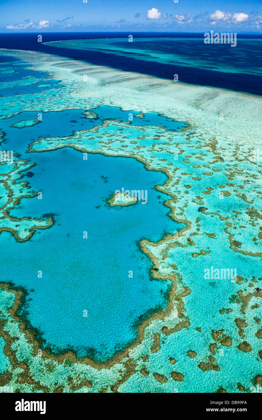 Aerial view of 'Heart Reef', a heart-shaped coral formation at Hardys Reef. Great Barrier Reef Marine Park Stock Photo