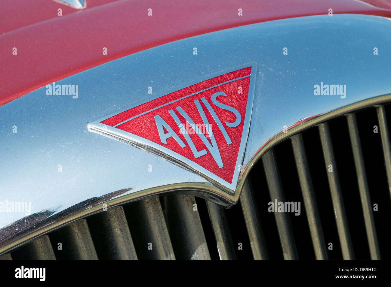 The badge on the chrome radiator grill of a classic British Alvis motor car Stock Photo