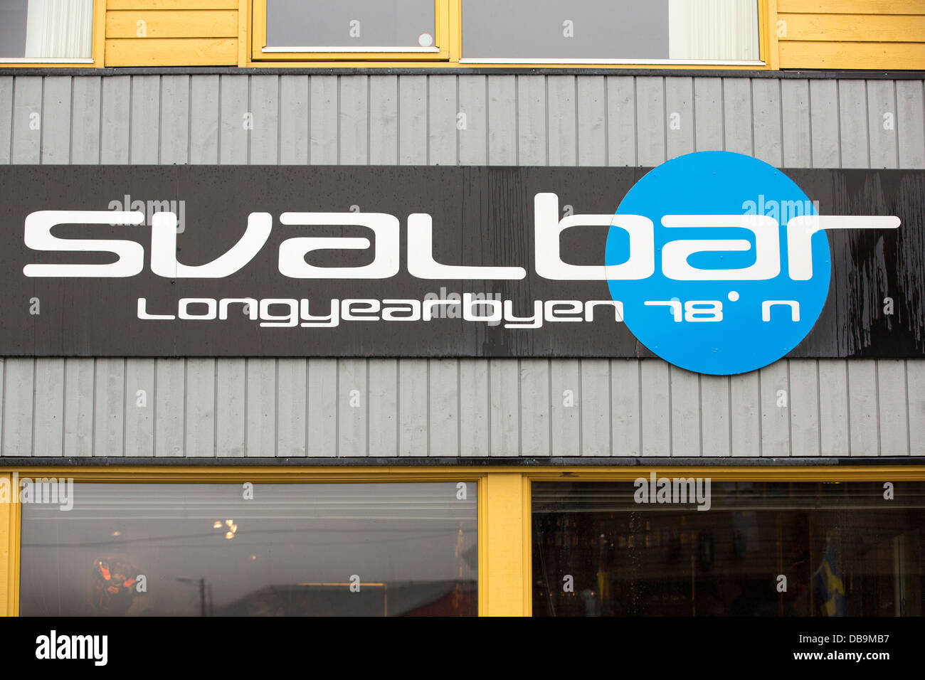 A bar in Longyearbyen, Spitsbergen, Svalbard, with its latitude and longitude written on it Stock Photo