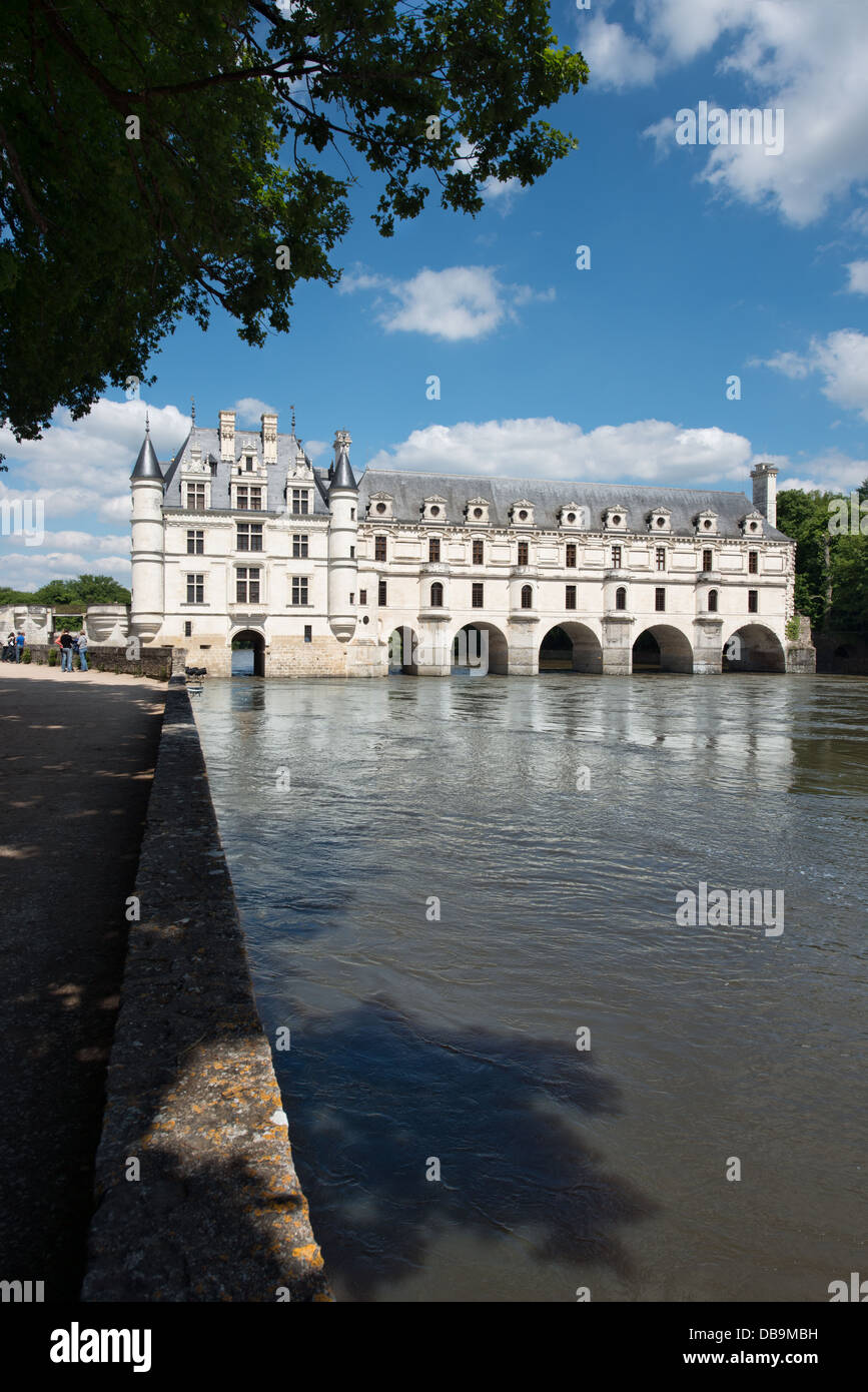 A portrait view of Château Chenonceau in the Loire valley, France showing the  main building spanning the river Stock Photo