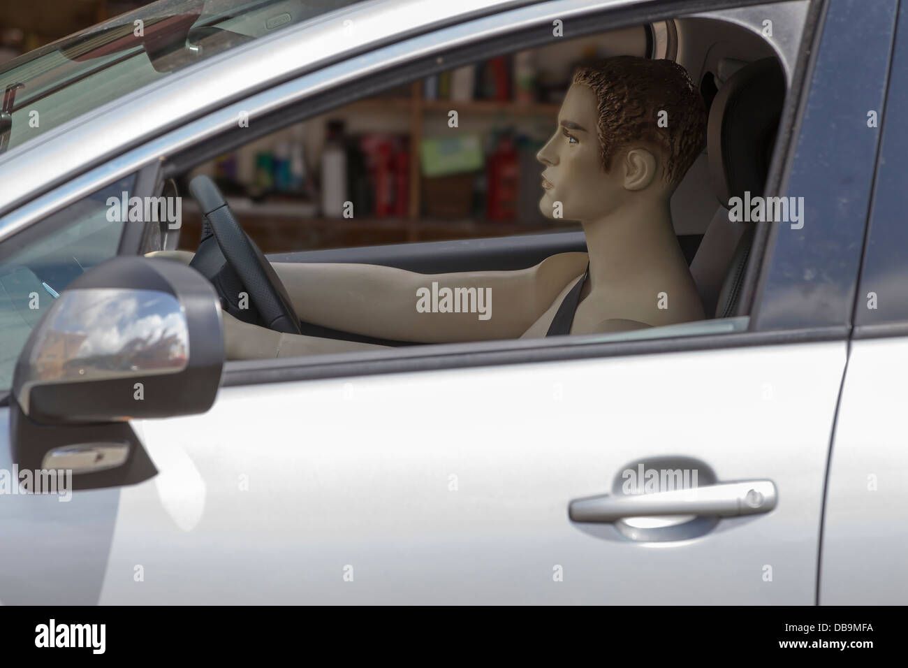 Mannequin in Drivers Seat of a car Stock Photo Alamy