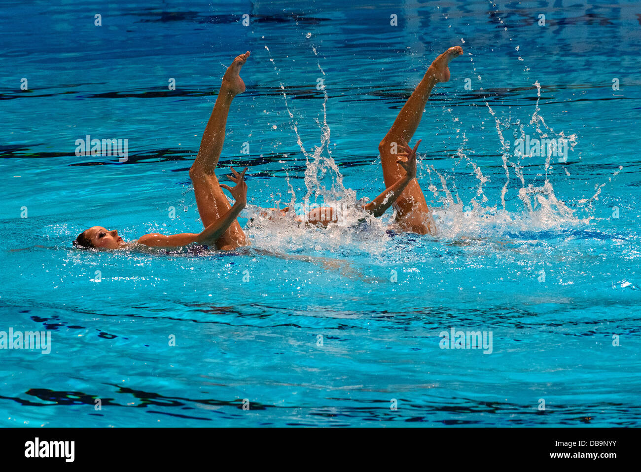 Barcelona, Spain. 25th July 2013: China's Tingting Jiang and Wenwen Jiang compete in the synchronized swimming Duet Free Routine finals at the 15th FINA World Championships in Barcelona Credit:  matthi/Alamy Live News Stock Photo