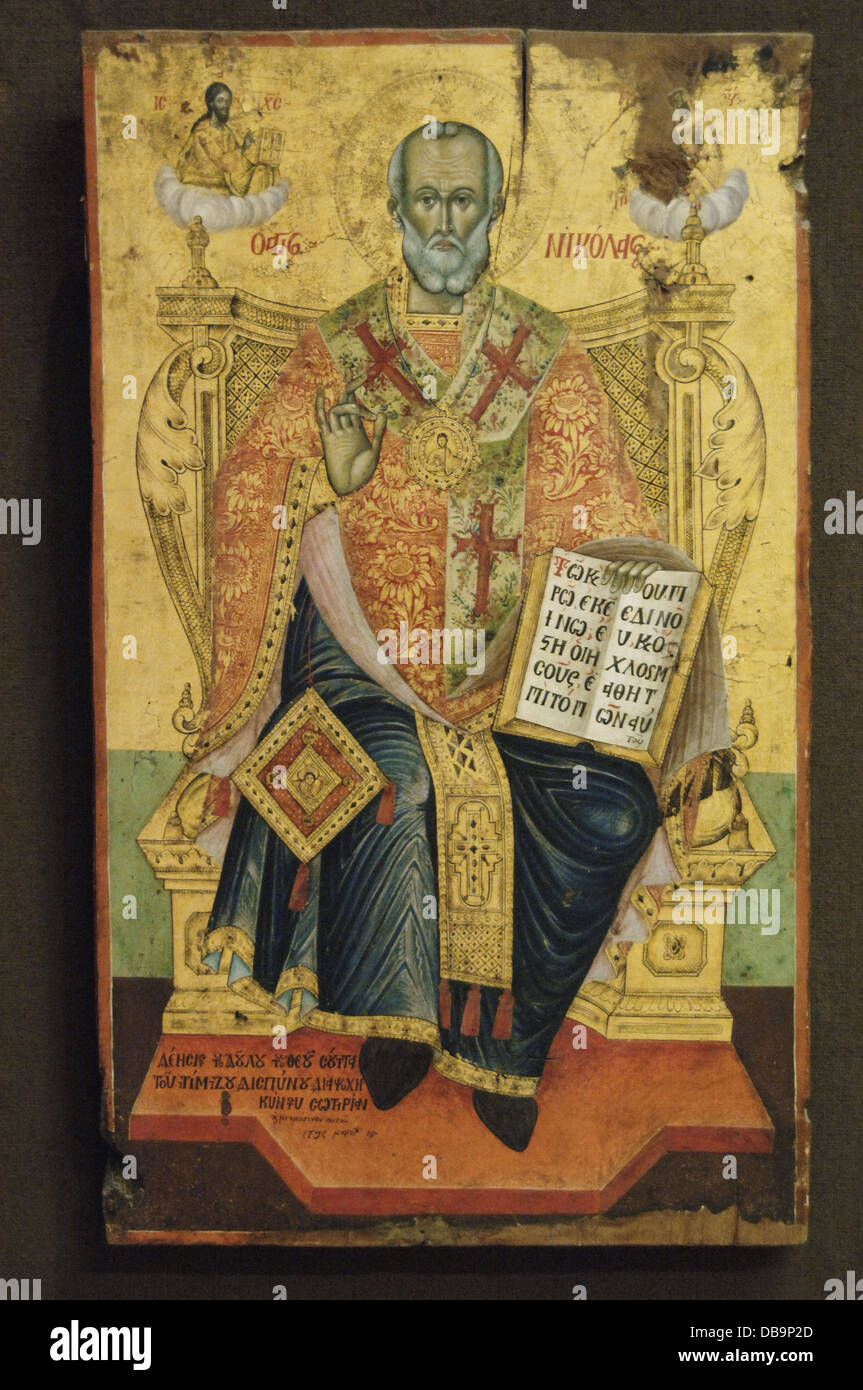 Saint Nicholas ( 270 –343) or Nikolaos of Myra holding the Gospels and blessing. Anonymous. 18th century. Stock Photo