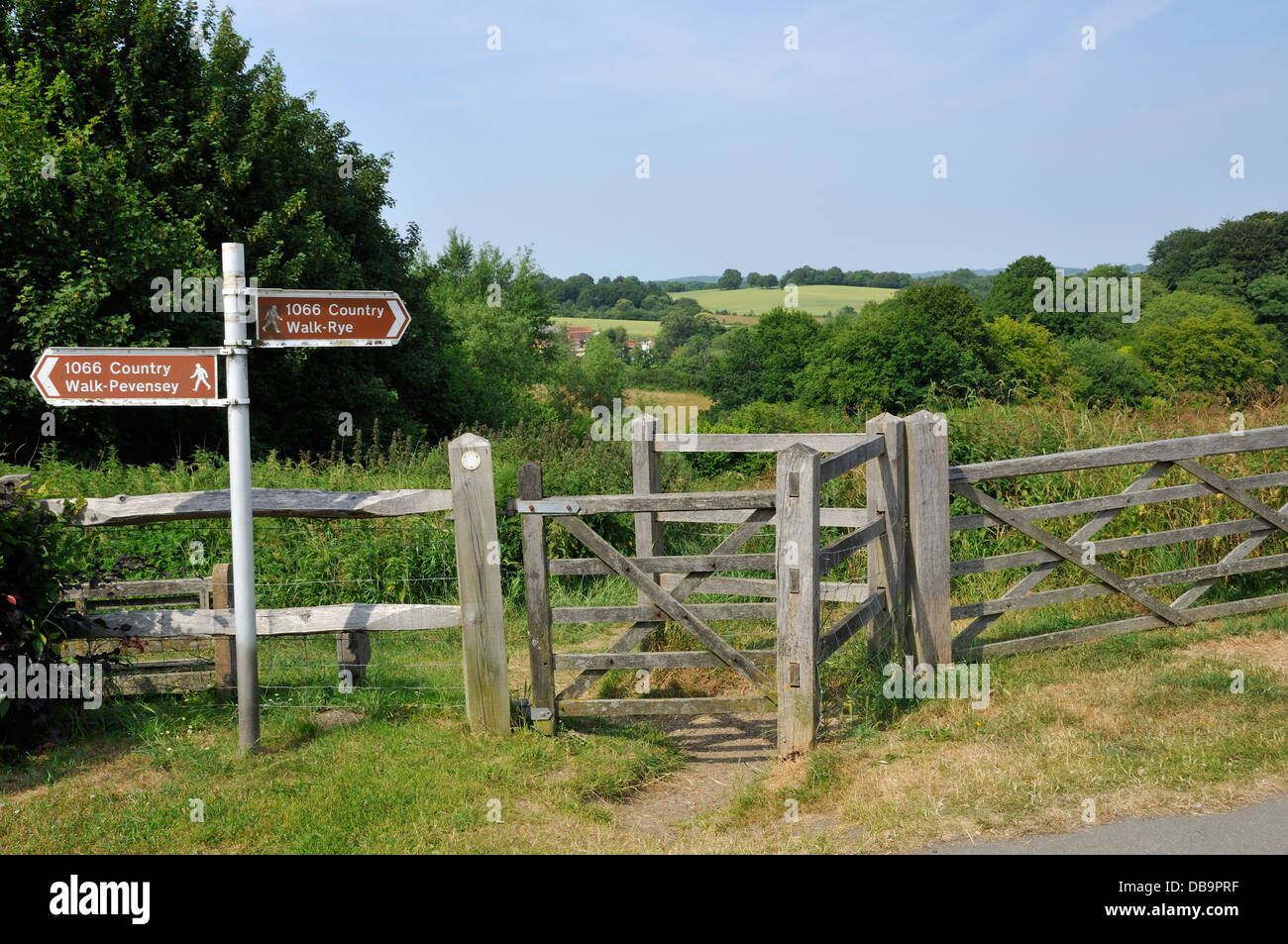 The 1066 country footpath signpost and countryside at Battle, near Hastings, East Sussex, South East England Stock Photo