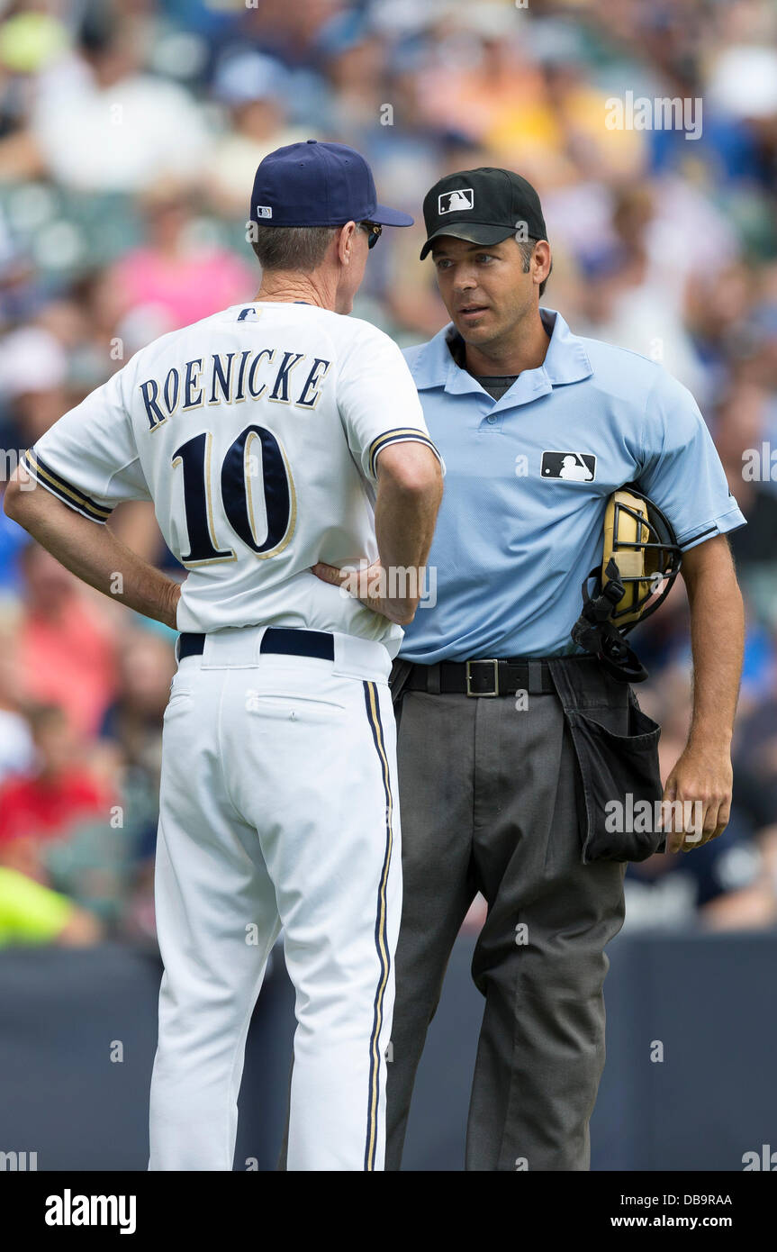 Milwaukee, Wisconsin, USA. 25th July, 2013. July 25, 2013: Milwaukee Brewers manager Ron Roenicke #10 discusses a foul ball called by the home plate umpire James Hoye during the Major League Baseball game between the Milwaukee Brewers and the San Diego Padres at Miller Park in Milwaukee, WI. San Diego beat Milwaukee 10-8. John Fisher/CSM. Credit:  csm/Alamy Live News Stock Photo