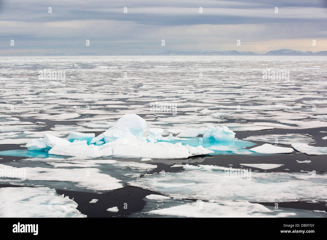 Rotten sea ice at over 80 degrees North off the north coast of Svalbard. Climate change is causing sea ice to retreat rapidly Stock Photo