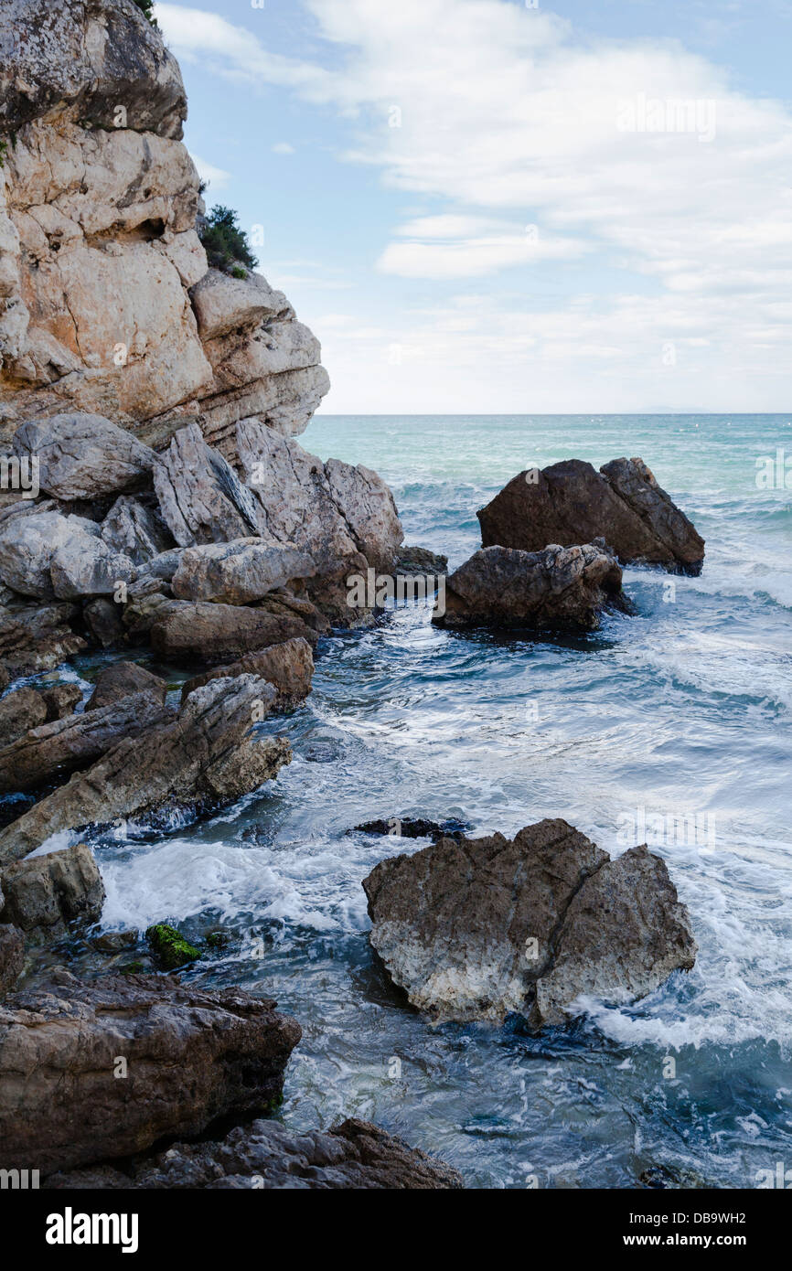 rocky outcrop at beach cove Stock Photo