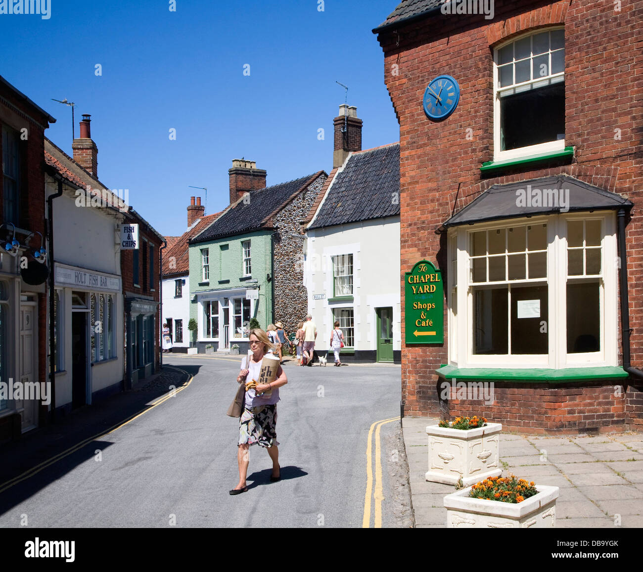 Historic buildings and shops Holt Norfolk England Stock Photo