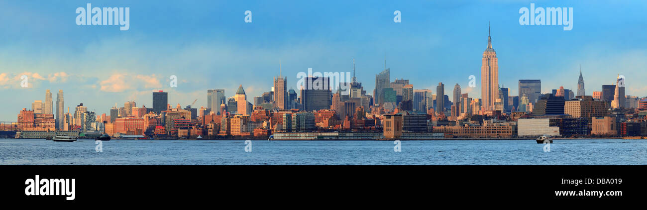 Downtown Manhattan skyline at sunset over Hudson River in New York City ...