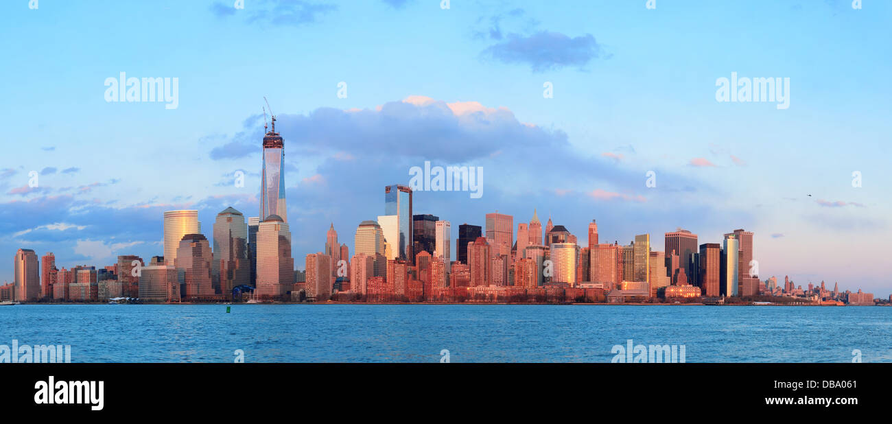 Downtown Manhattan skyline at sunset over Hudson River in New York City ...