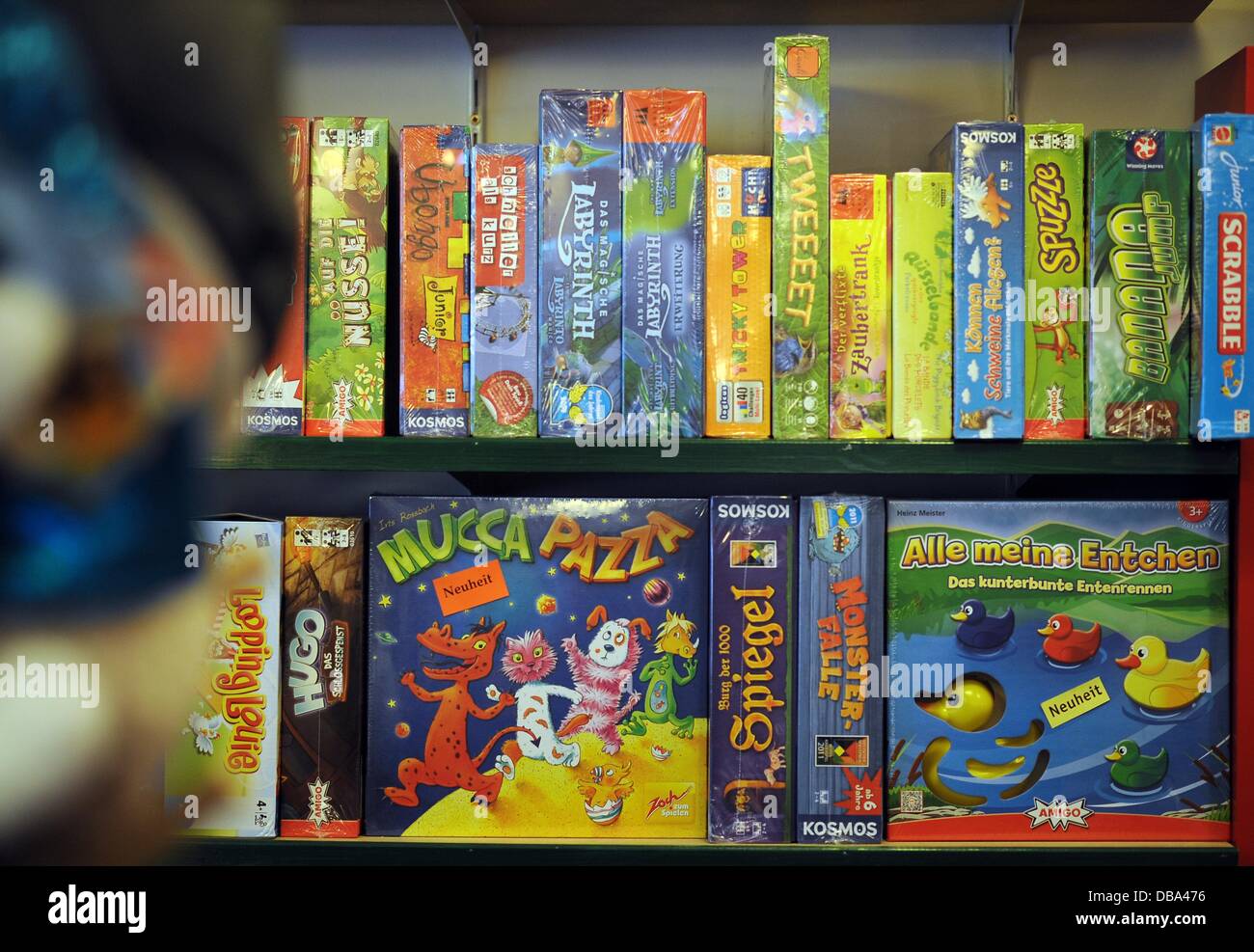 Games are on display at 'Spielzeit' toy store in Cologne, Germany, 26