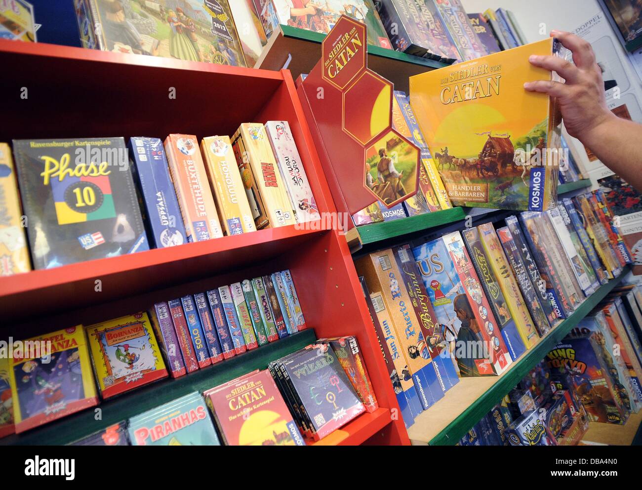 Games are on display at 'Spielzeit' toy store in Cologne, Germany, 26