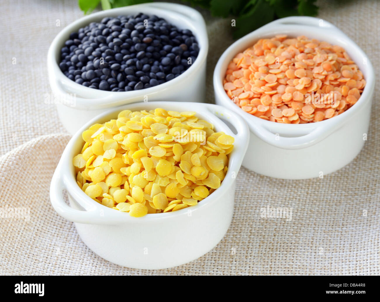 different kinds of lentils - red, yellow and black Stock Photo - Alamy