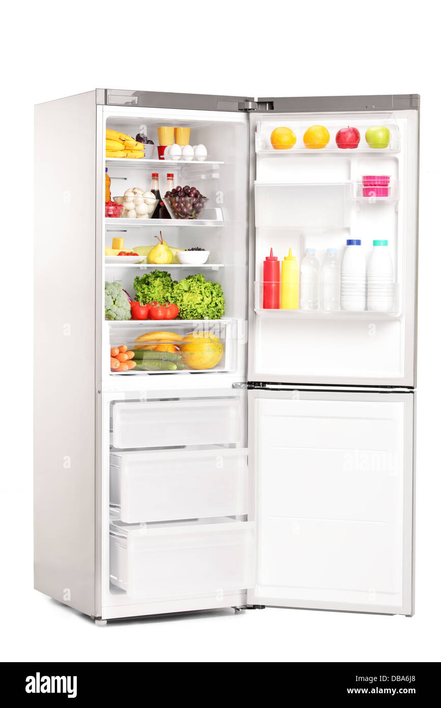 Open fridge full of healthy food products Stock Photo