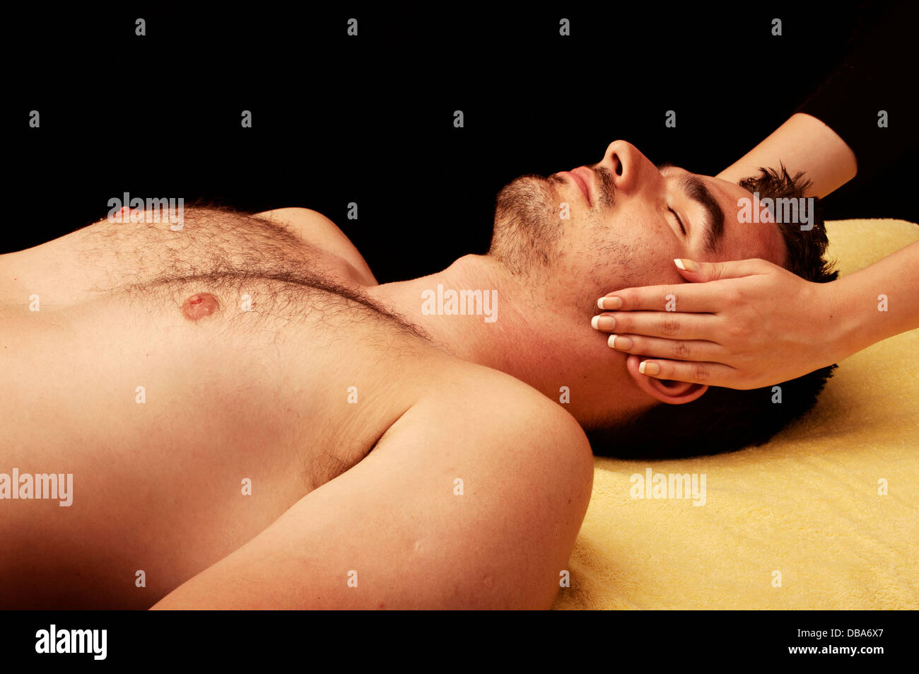 Man getting a face massage Stock Photo