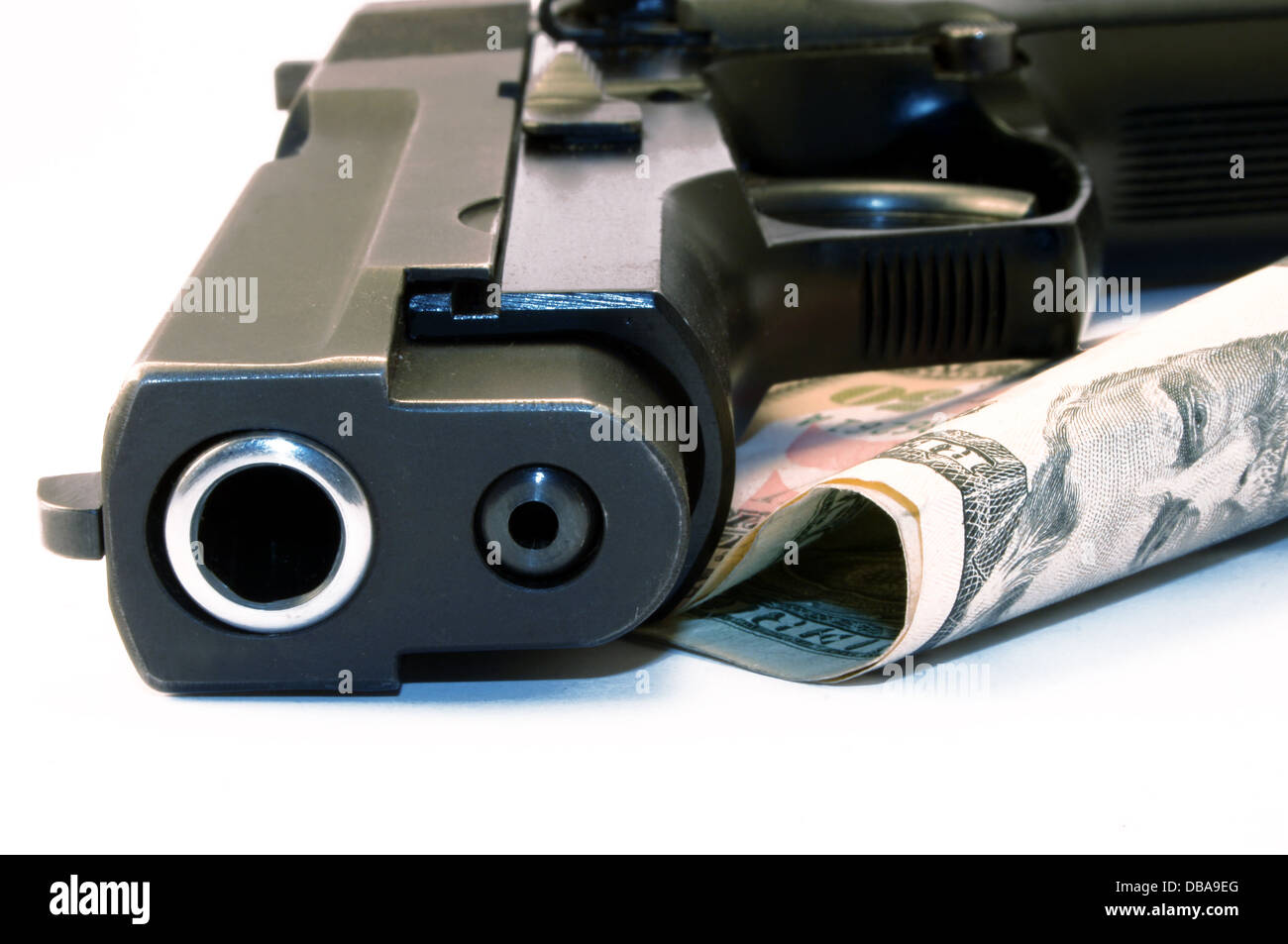 Gun and US dollars Stock Photo