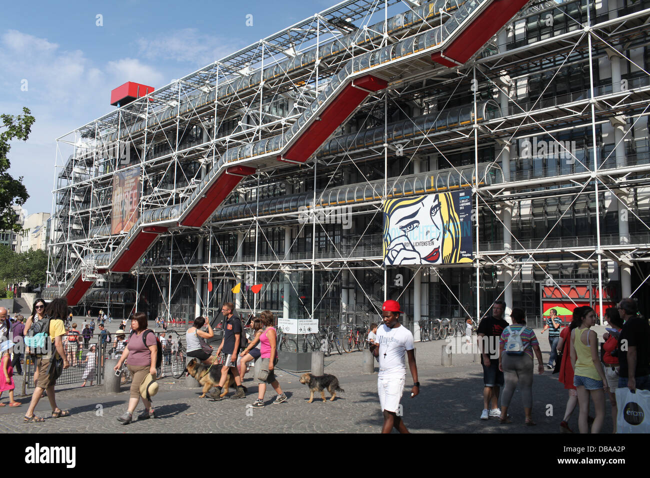 Crowds in front of the west side of the Pompidou Centre, art gallery in Paris. A large Andy Warhol pop-art poster is seen Stock Photo