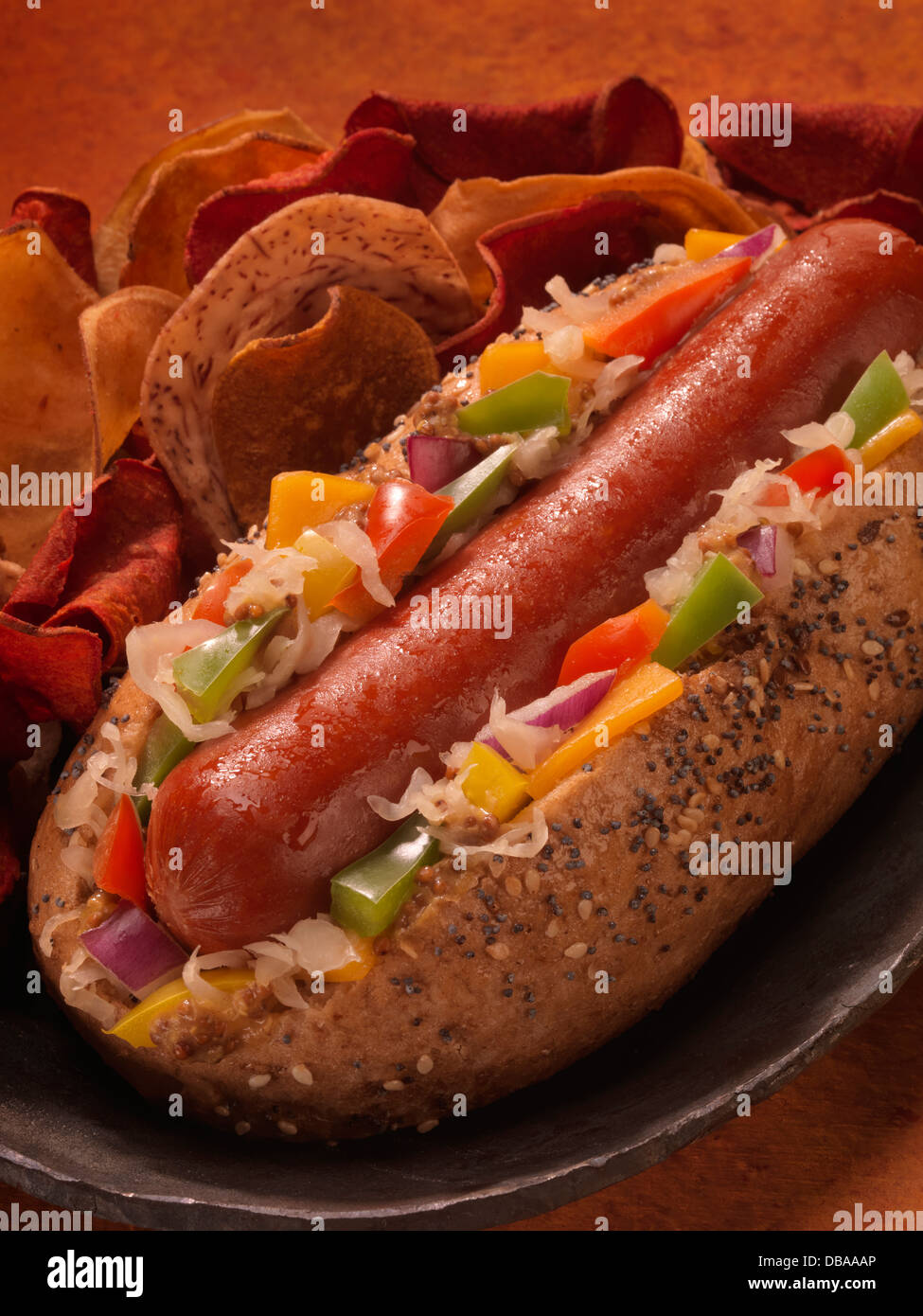 A loaded Chicago style hot dog with deli chips. Stock Photo