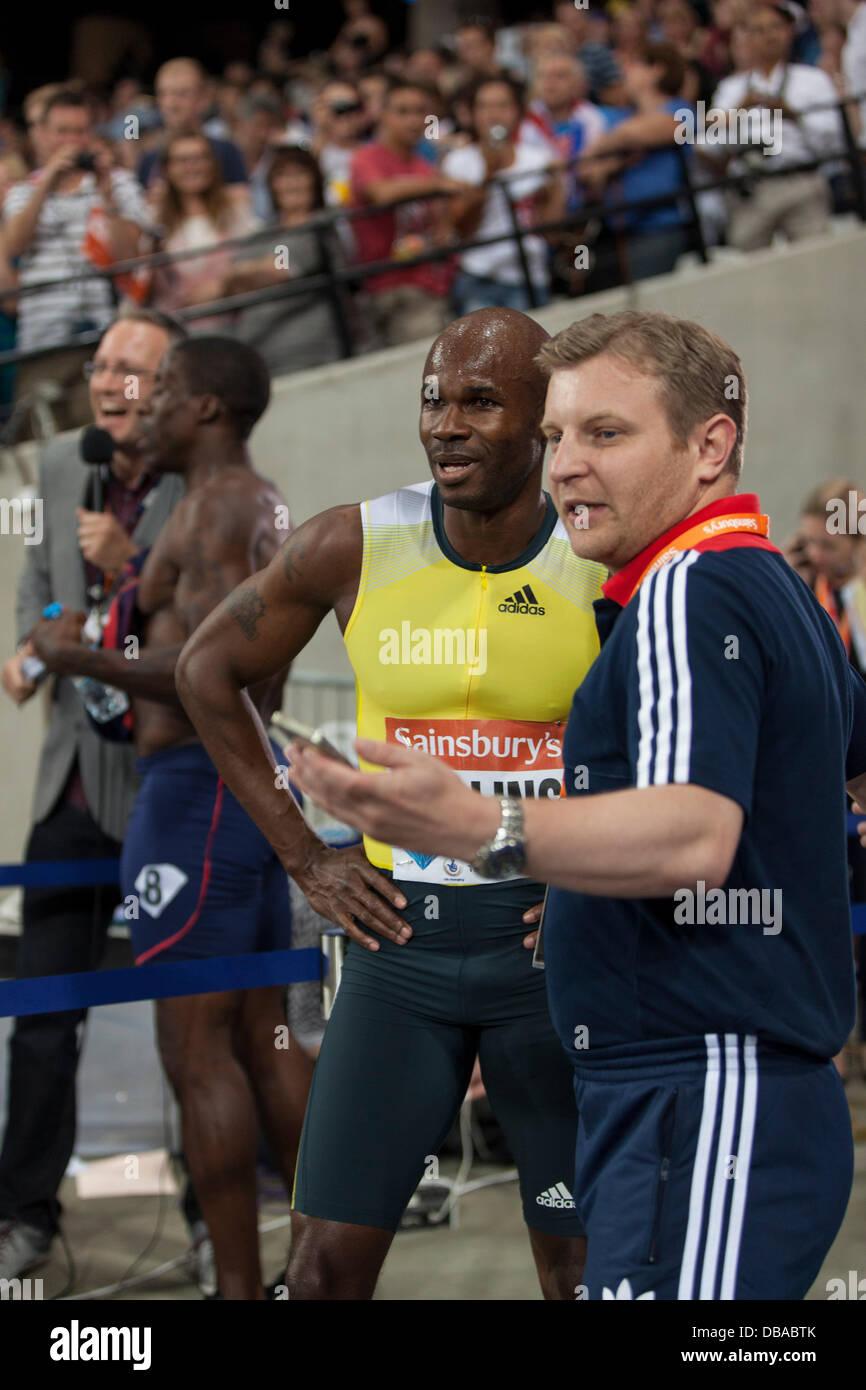 London, UK. 26th July, Kim Collins speaks to press after 100m mens race, Kim Collins 4th place, Anniversary Games British Athletics, London. 2013. Photo: Credit: Rebecca Andrews/Alamy Live News Stock Photo