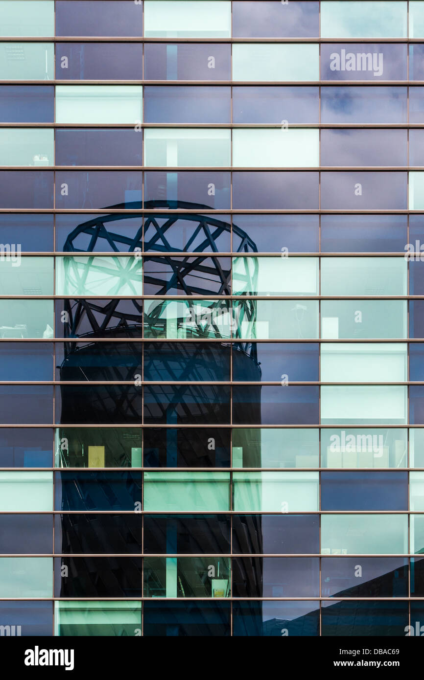 Reflection of Lowry Theatre building in glass office building at MediaCity, Salford Quays Stock Photo