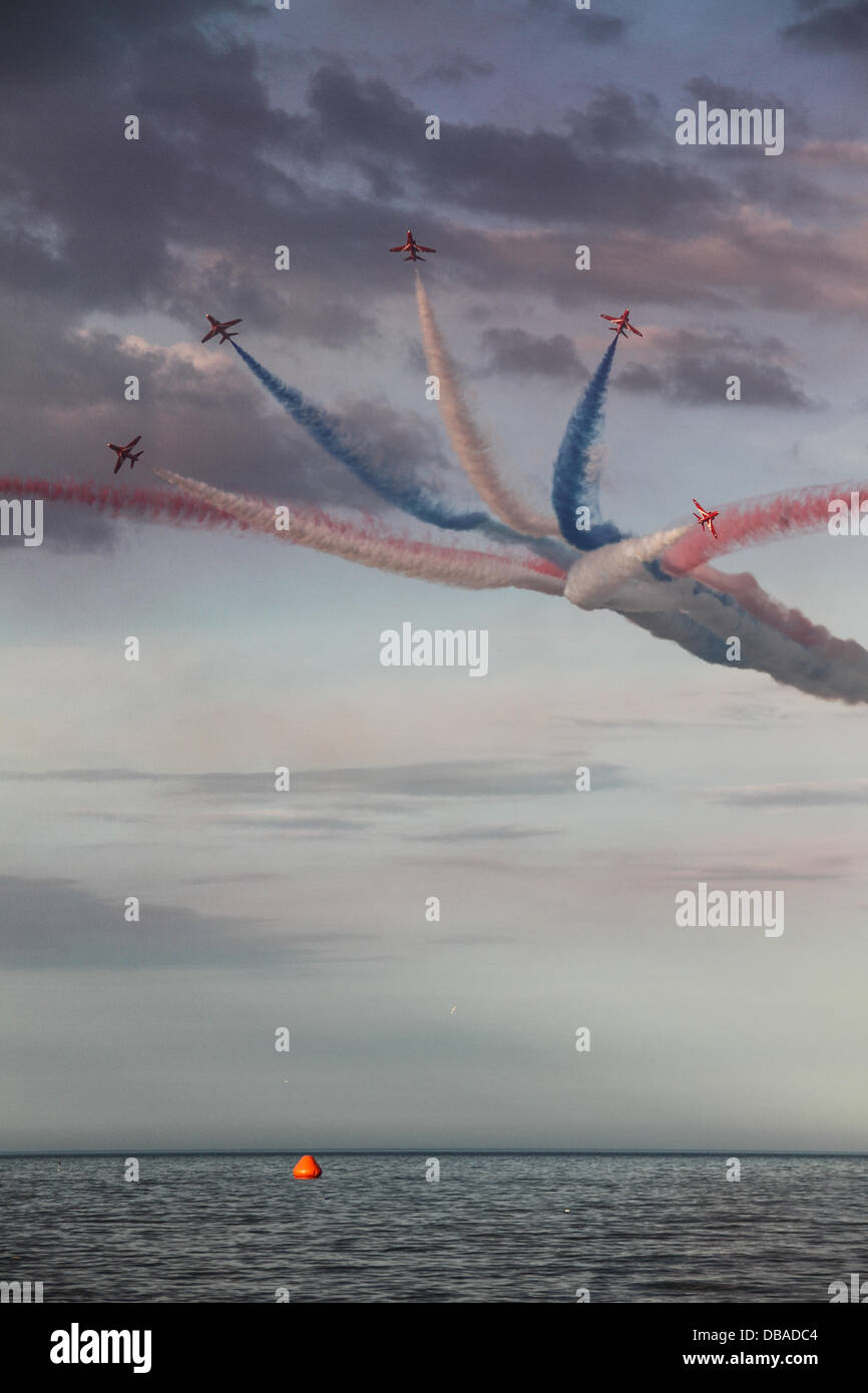 Sunderland, UK. 26th July, 2013. A flying demonstration of the skills of the Lincolnshire based Red Arrows team, flying over the North Sea at Sunderland, Tyne and Wear, England on Friday, 26 July, 2013 Credit:  Daniel Magill/Alamy Live News Stock Photo