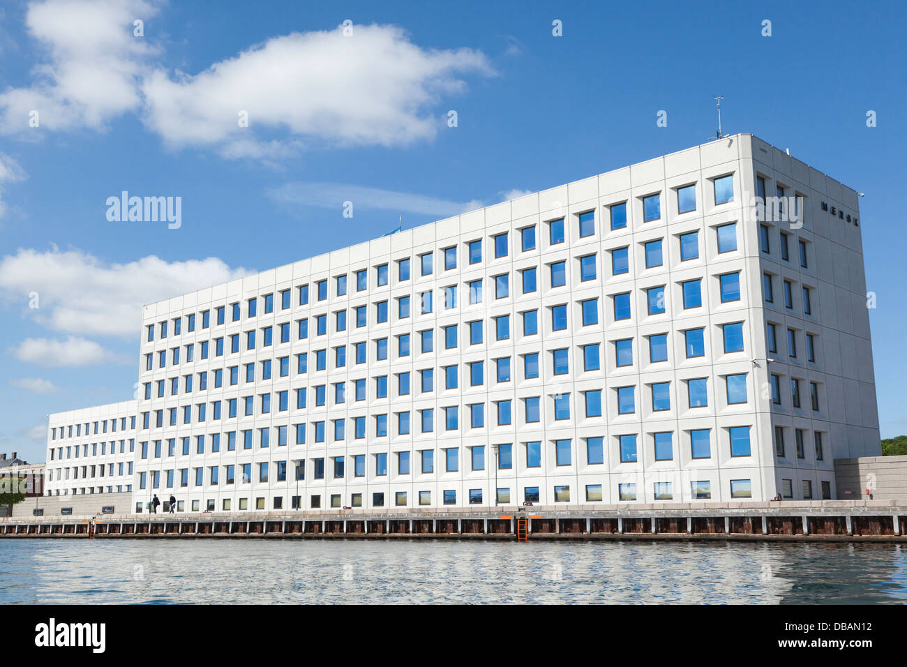 Office building of Maersk Shipping Company with blue windows at Larsens