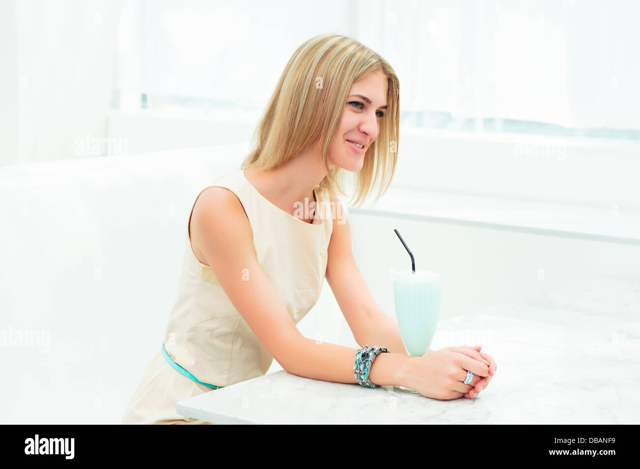 portrait of a beautiful woman in the cafe Stock Photo - Alamy