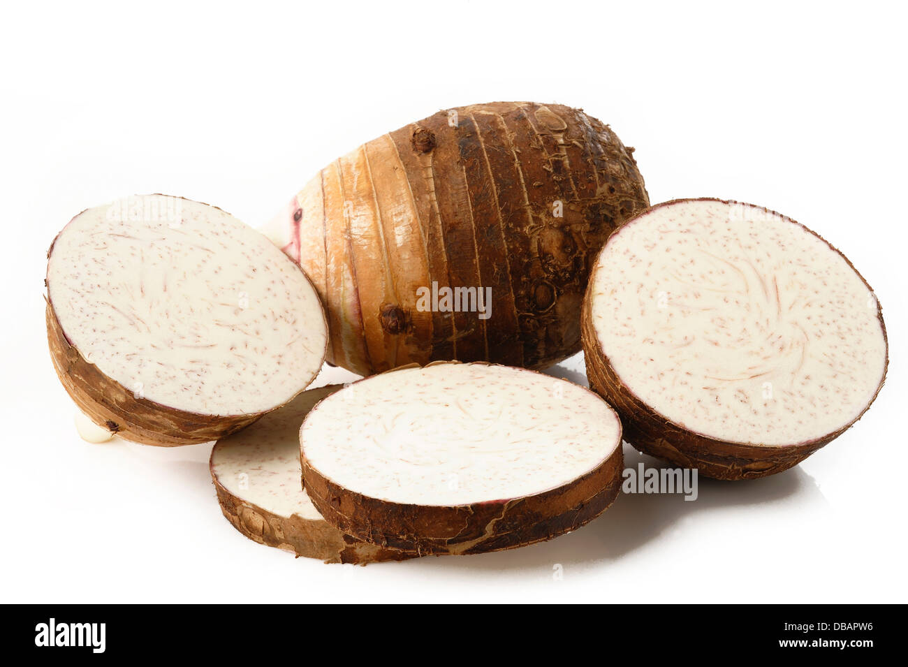 taro roots on white background Stock Photo