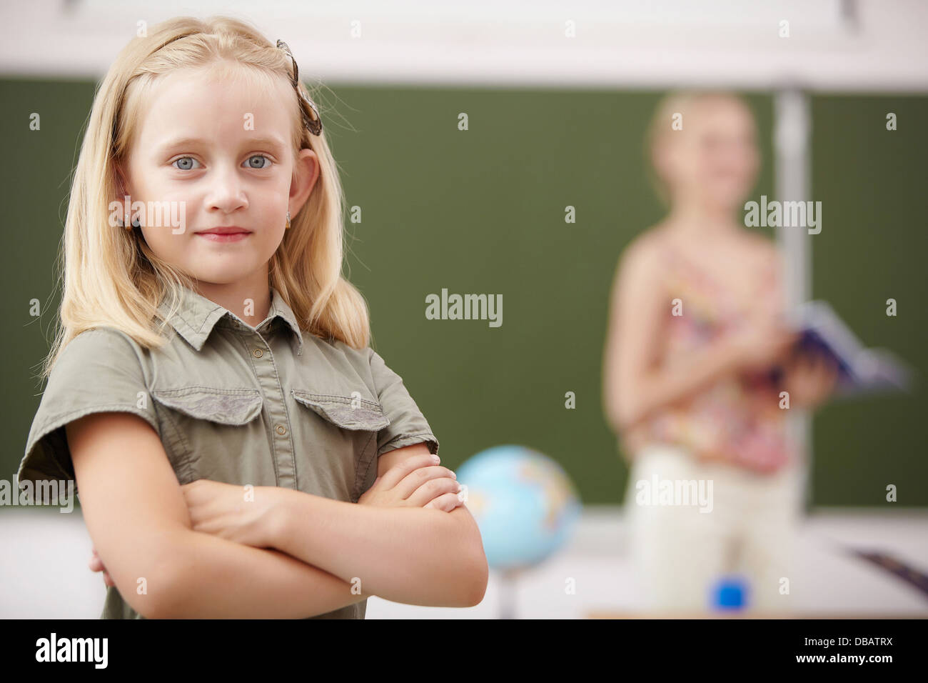 Little girl at school class Stock Photo Alamy