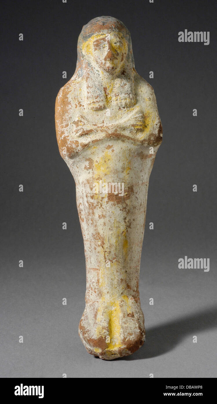 Shabti A Shabti figure, an ancient Egyptian funerary figurine, often placed in ...