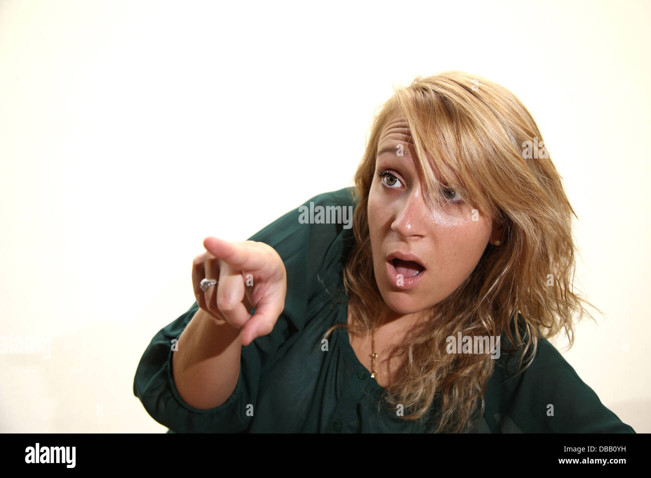 Woman pointing young girl hi-res stock photography and images - Alamy