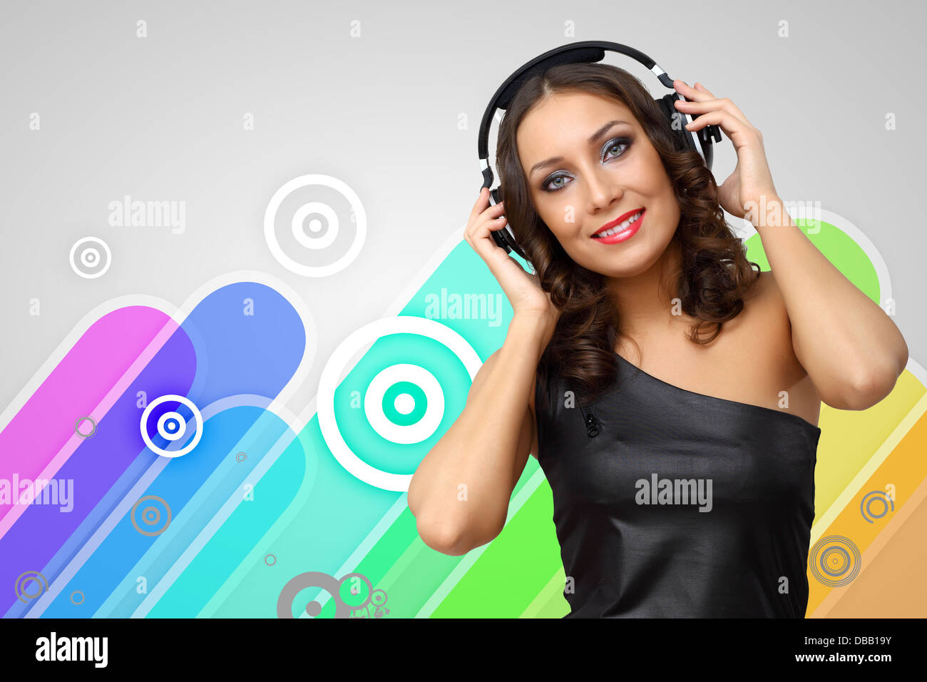 Portrait of young woman with headphones Stock Photo - Alamy