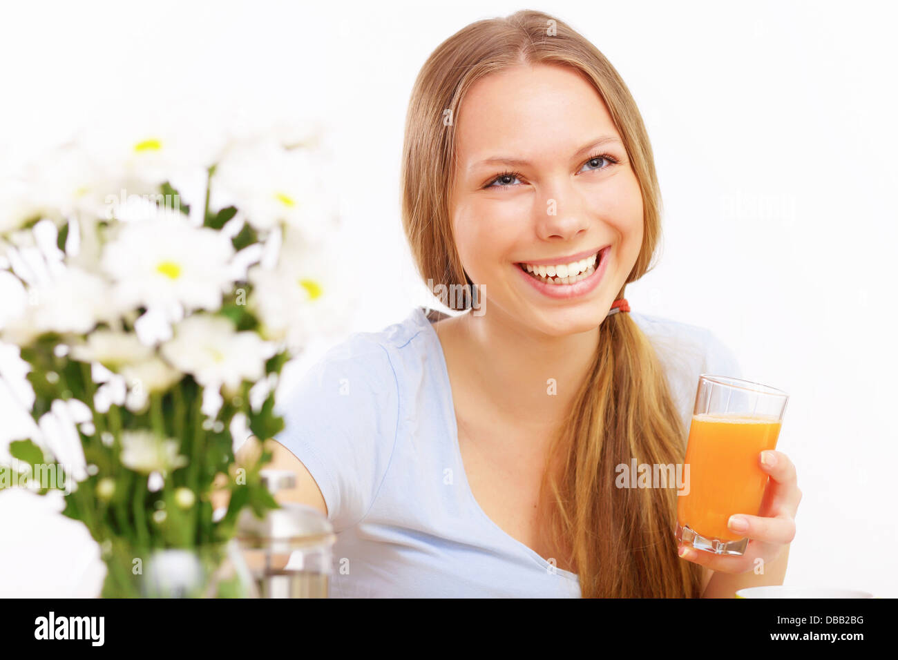 Beautiful young woman drinking tea Stock Photo Alamy