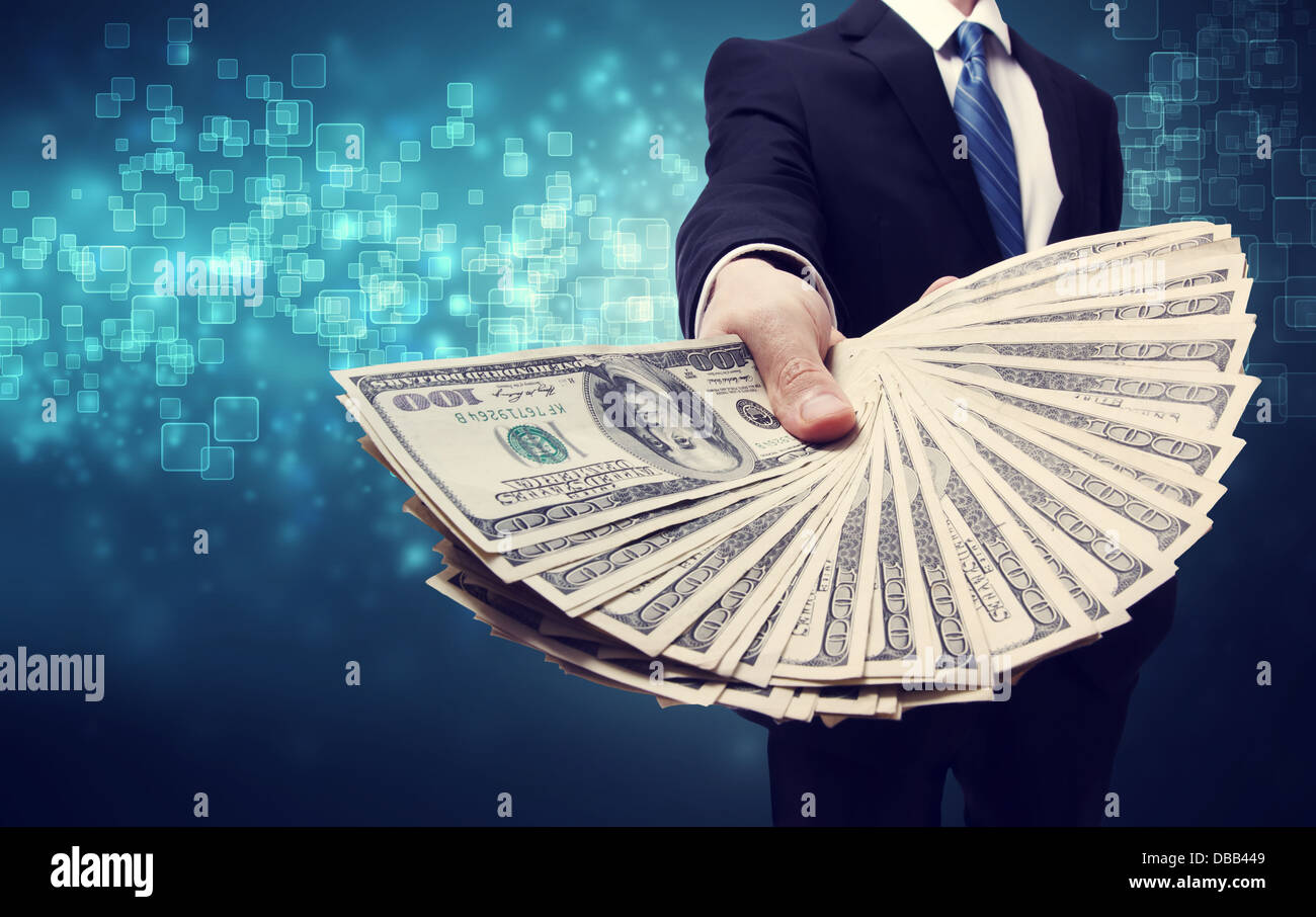 Business Man Displaying Spread of one hundred dollar bills Stock Photo ...
