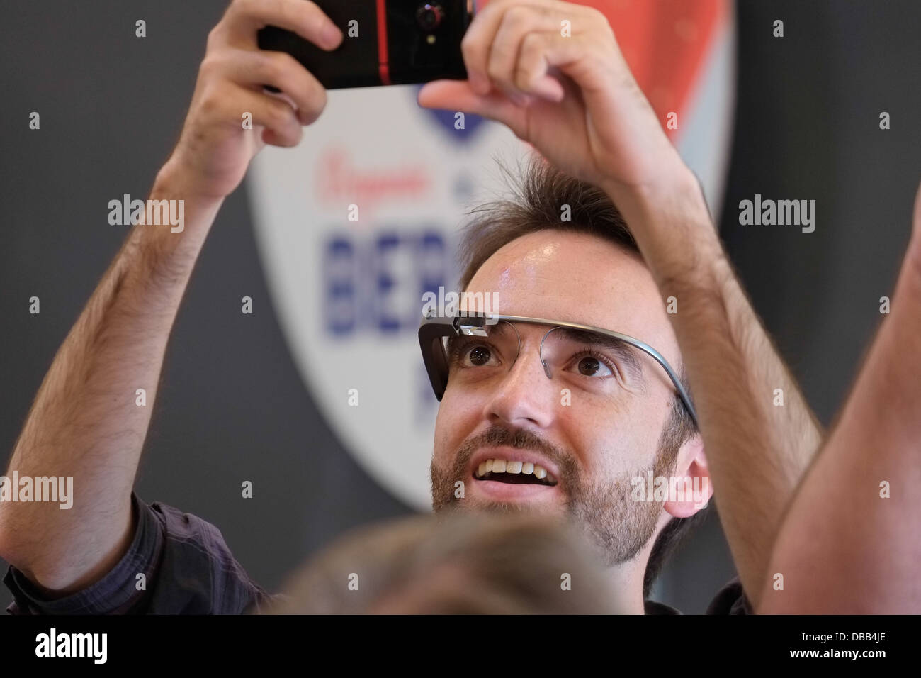 Man wearing Google Glass glasses. Stock Photo