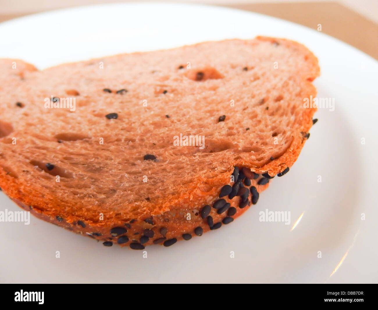 whole grain bread slice on white dish Stock Photo - Alamy