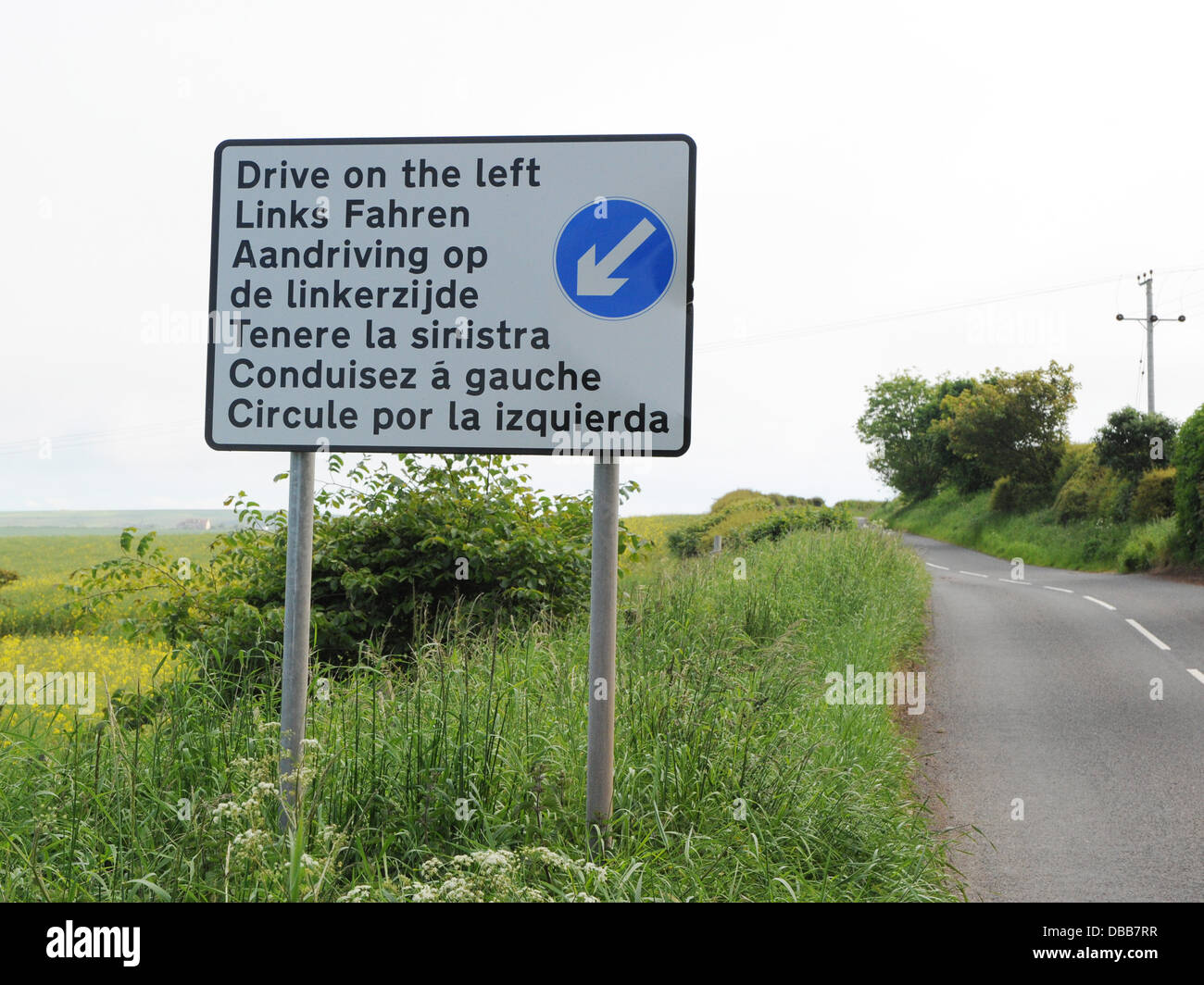 A sign that says drive on the left Stock Photo Alamy
