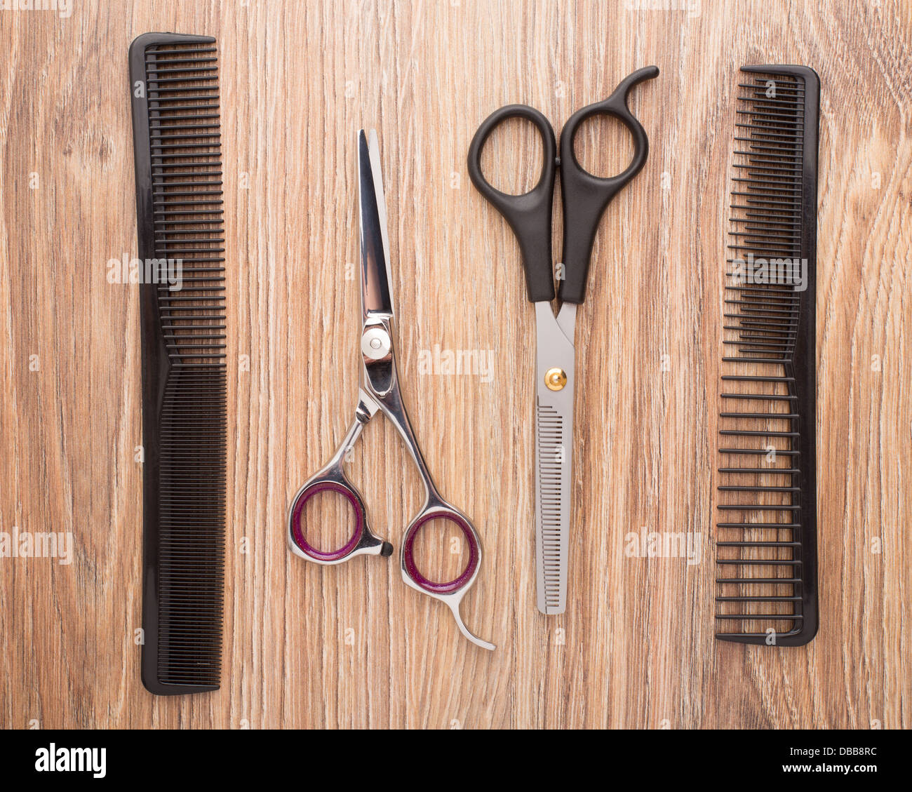 Barber accessories on wooden table Stock Photo