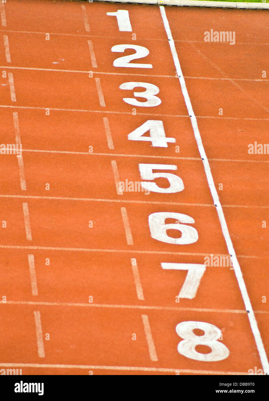 red track lane for running competition Stock Photo