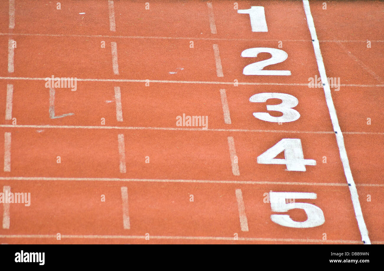 red track lane for running competition Stock Photo