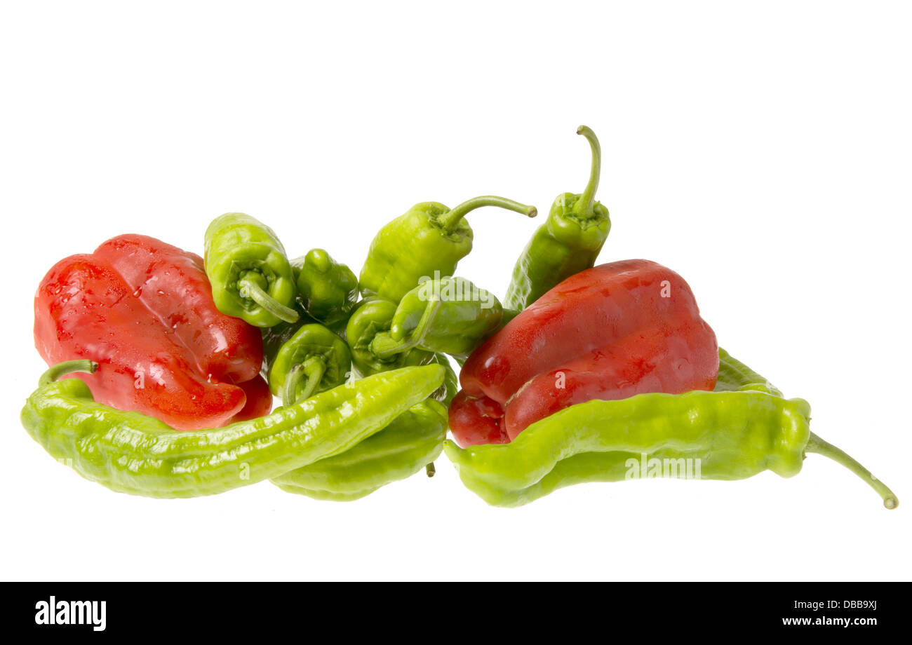 Red and green peppers isolated against white background Stock Photo - Alamy