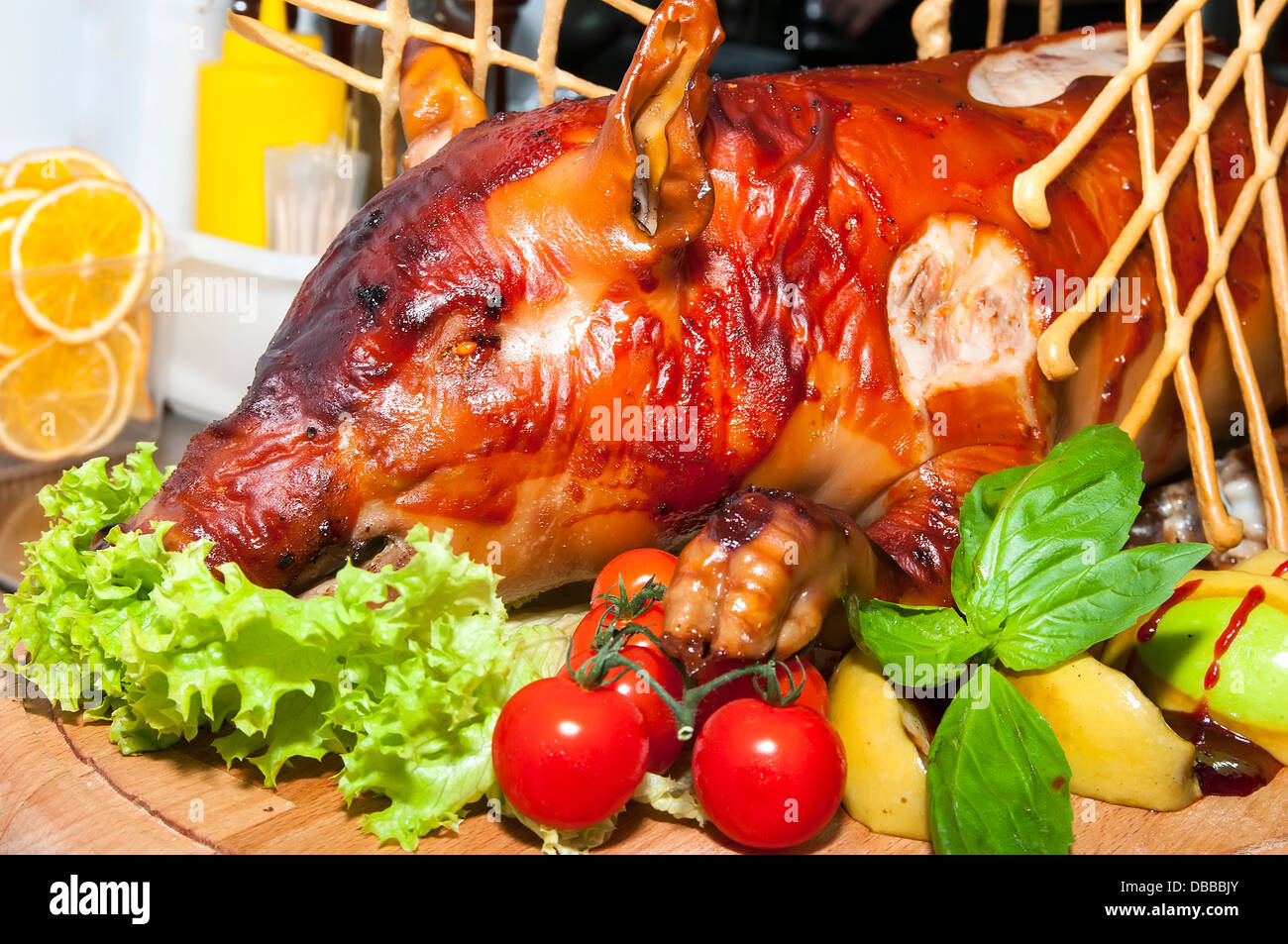 roasted pig with herbs and vegetables Stock Photo Alamy