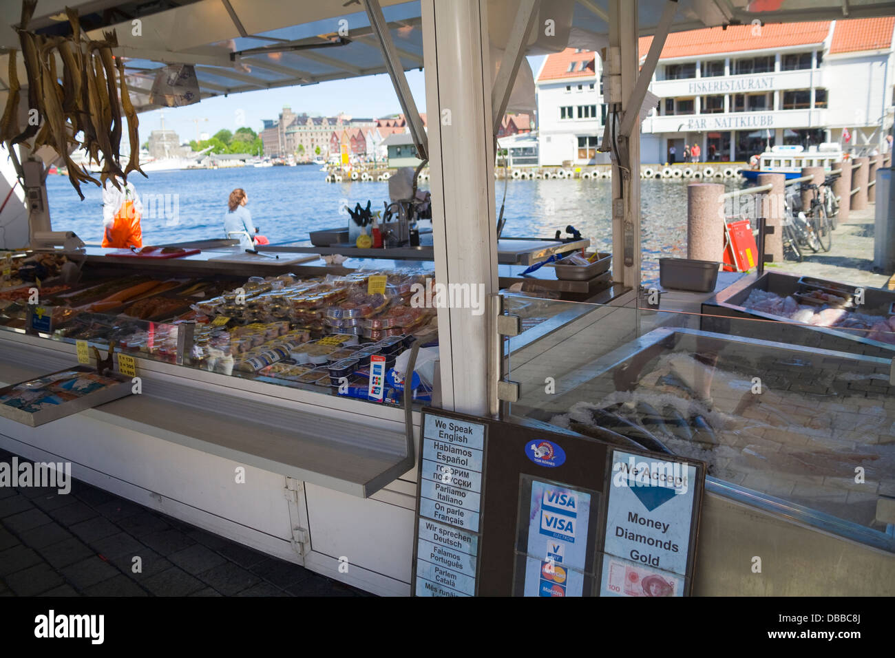 Bergen Norway Europe Outdoor market stall in world famous Fish Market Torget i Bergen selling a variety fish products Stock Photo