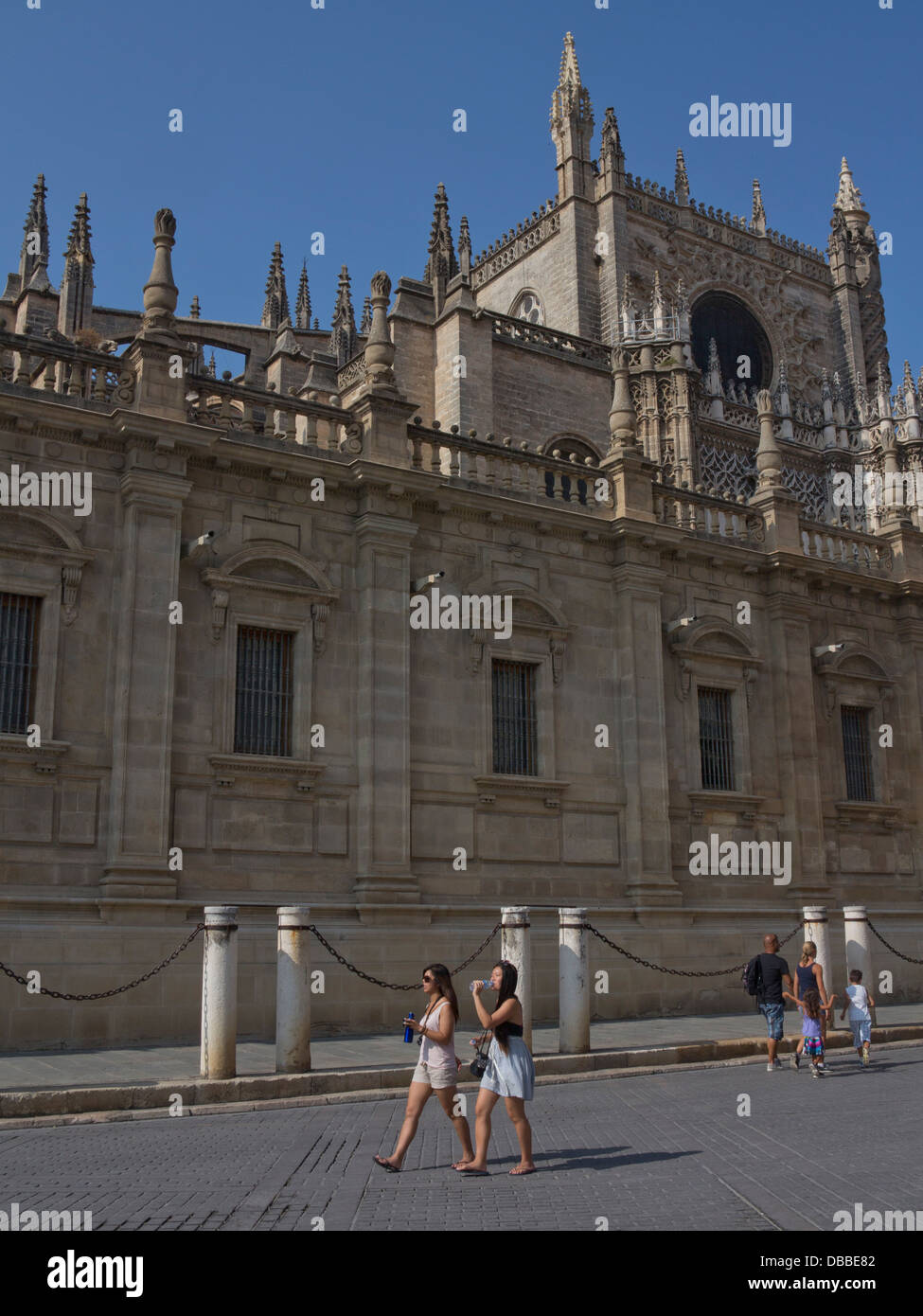 Tourists by the cathedral at Sevilla, Andalucia, Spain Stock Photo - Alamy