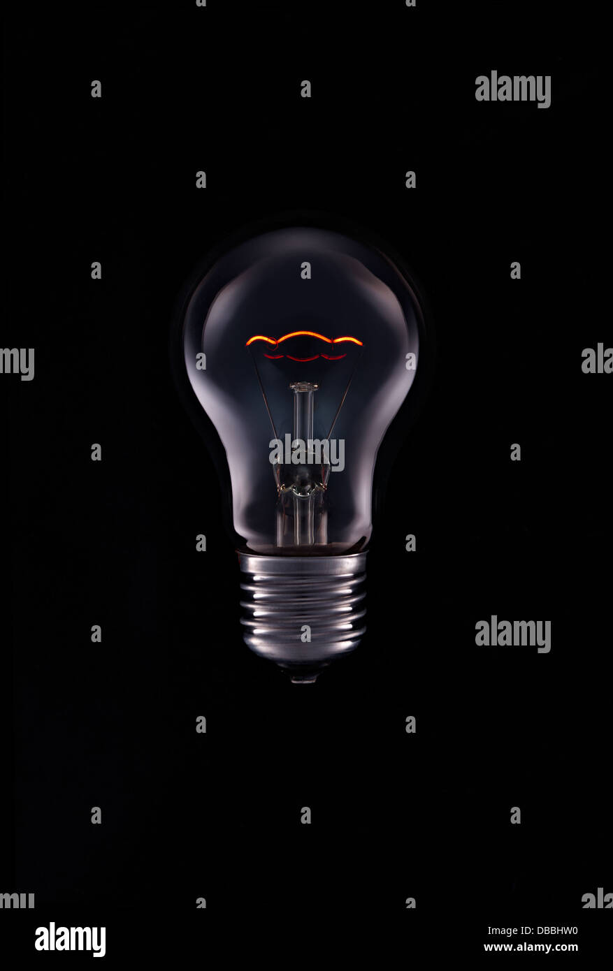 Bulb lamp with lighting glower on black background Stock Photo
