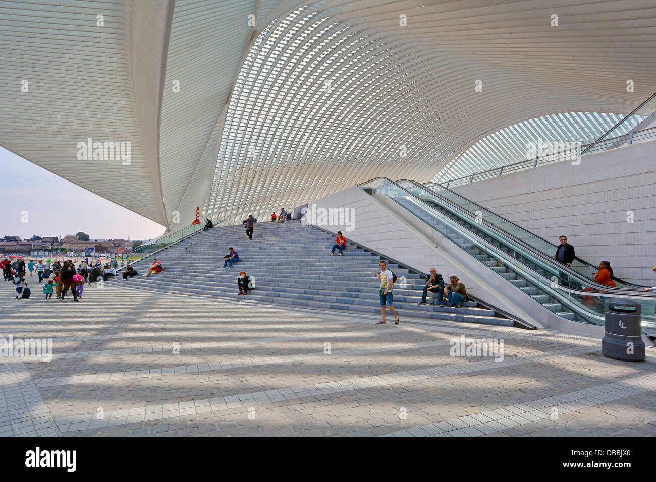 Futuristic glass roof of exterior modern building architecture to Liege train station entrance steps & escalator covered by glass ceiling belgium, EU Stock Photo