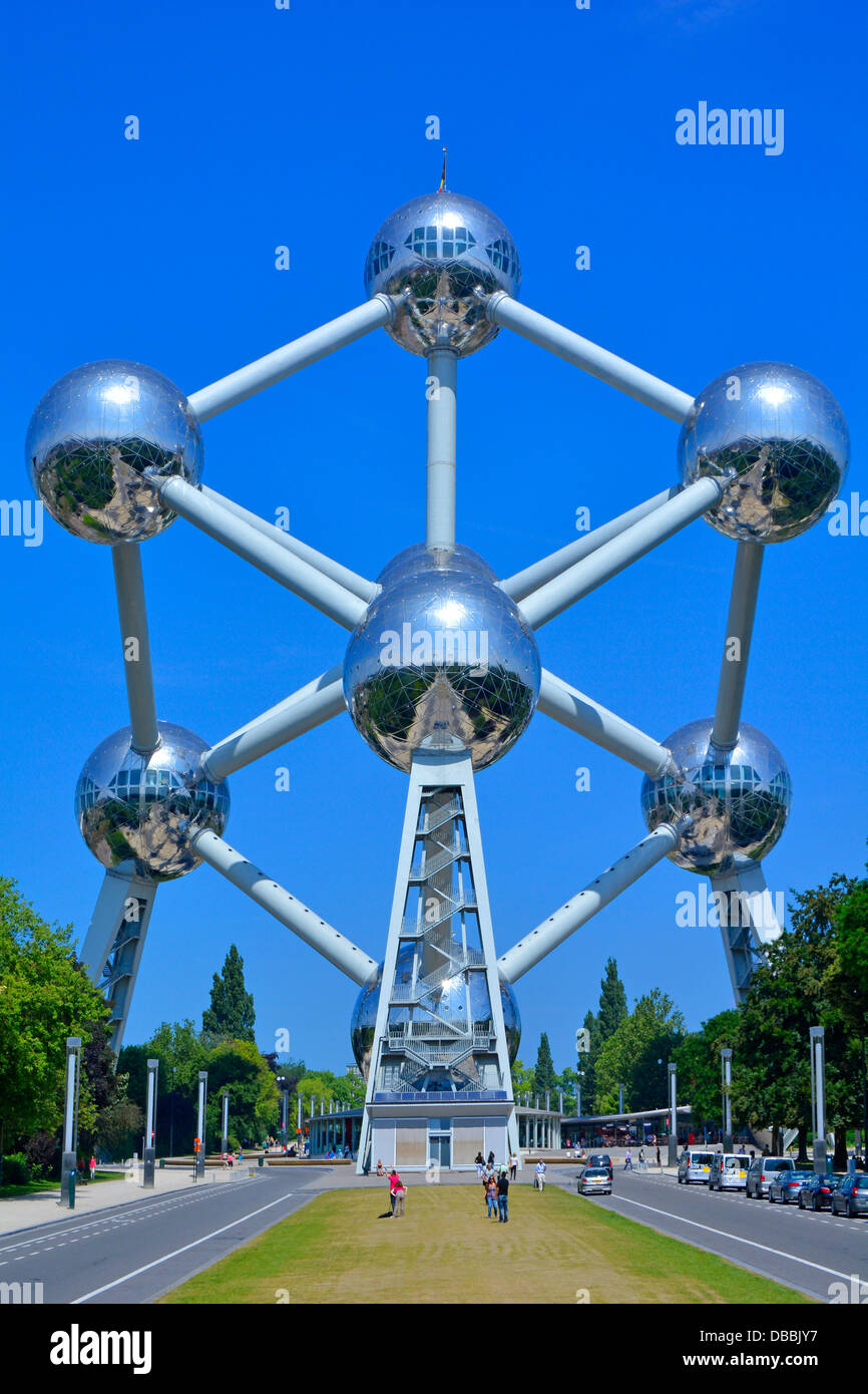Atomism nine stainless steel clad spheres forming shape of a unit cell of an iron crystal magnified 165 billion times Atomism Park Brussels Belgium Stock Photo